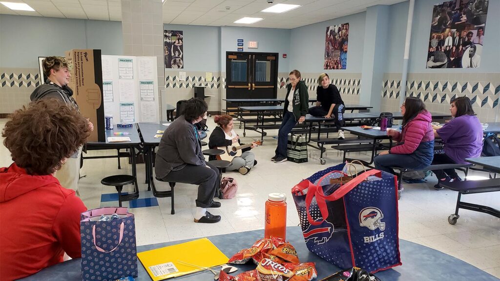 guitar performance in school cafeteria